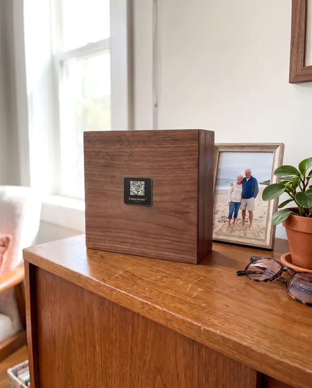 A second Lumestone plaque on a wooden keepsake urn at home