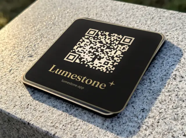 Close-up of an engraved Lumestone plaque on granite